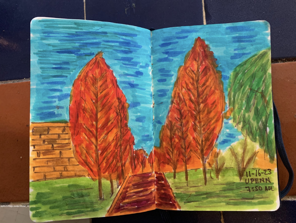 Sketchbook painting of two orange autumn trees